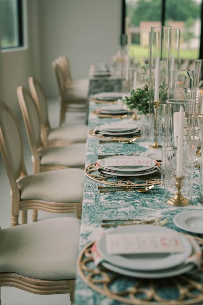The sponsor's table with blue tablecloth, and candles.