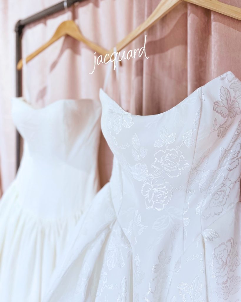 jacquard wedding dresses hanging up
